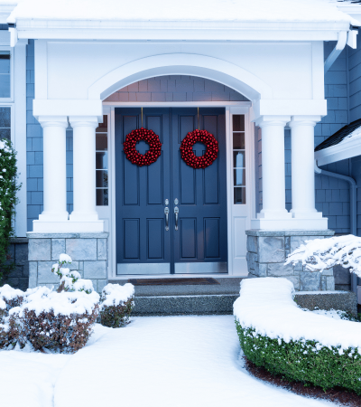 energy efficient entry door in minneapolis covered in snow